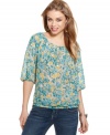 Go rustic-chic in a floral print blouse from GUESS? Pair it with your favorite jeans for a relaxed yet feminine look.