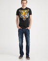 Soft cotton with bold tiger print on the front.Short sleevesCrew necklineCottonMachine washMade in Italy