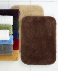 Classic comfort. Plush, Comforel nylon provides a sweet retreat for your feet in this sumptuously soft Charter Club bath rug. Choose from a lush array of bleach-and-stain resistant hues.