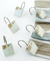 Bring the memories of a beachside vacation into your bathroom with this By the Sea bath collection. Shower curtain hooks are a bath essential. Crafted in glossy metal.