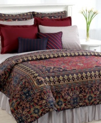An ornate Persian rug design in rich hues of navy and burgundy give this Lauren Ralph Lauren duvet cover a look of classic distinction. Featuring 100% cotton with a printed face and textured reverse, finished with a decorative cord along the edges.