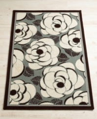 Everything is coming up roses with the Sabrina Blue accent rug. Featuring natural cotton in a modern floral motif, this versatile rug is at home in any room. Also features a skid-resistant back; easy-care.