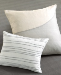 Quintessentially modern, the Quince Pieced Silk decorative pillow brings understated elegance to your bedroom with its colorblock pattern and cool palette. Featuring a delicate silk overlay in two soothing neutral hues. (Clearance)