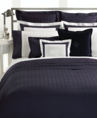 A border of solid navy brings contrast to this white Lauren Ralph Lauren sham featuring an allover, tone-on-tone Glen Plaid pattern. Also features 400 thread count cotton.