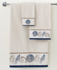 Life's a beach! Charm your bathroom in a look of seaside-inspired beauty with this Hampton Shells fingertip towel, featuring eclectic seashells in tan and blue tones for a calming appeal. Sheared velour face; terry reverse.
