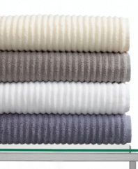 Totally textured. Ultra-absorbent in plush, Turkish cotton, this Hotel Collection's Textured Rib bath towel adds a new dimension of luxury to your everyday routine. Choose from four sophisticated hues.