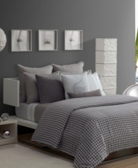 The Ombrone pattern from Lacoste features a shadowed grid print in stark grey, giving a new definition to multi-dimensional bedding. Combine this modern design with signature quilted accents and pure white sheeting for a truly luxe look.