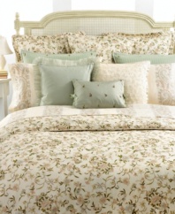 Classic paisley in soft colors alternates with a solid ivory stripe on this cotton sateen sheet, presenting a luxurious bedding addition from Lauren Ralph Lauren.