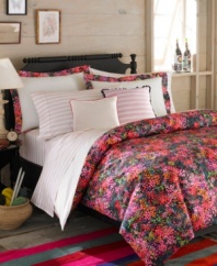 The Midnight comforter set features a vibrantly colored wildflower garden over a black ground. A polka-dotted reverse allows you to mix and match to suit your mood. Complete the look with the Midnight striped sheet set for extra ladylike luxe. (Clearance)