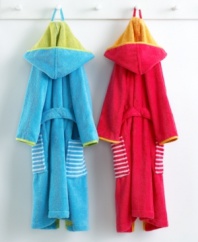 Hooded robes in incredibly soft cotton keep kids toasty warm and extra cute. In bright punch or sky blue with striped pockets and an attached belt that can't go missing.