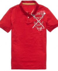 American Rag brings the collegiate cool to your wardrobe with their remix on a classic polo shirt.