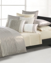 Embellished with pleated stripes along the top and bottom, Natori's Soho pillow sham has an undeniably modern sophistication. Featuring soft linen and cotton finished with a dazzling metallic sheen; button closure.