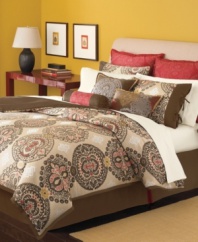Eastern-inspired medallion designs pop with hints of vibrant red and metallic threads over sumptuous neutral colors. The Brick Lane comforter set from Martha Stewart Collection combines these lush colors with detailed embroidery and smooth ribbon trims upon accent pieces for a hint of feminine allure.