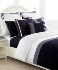 Polished perfection. Classic navy seersucker and bright white basketweave twill come together in the Williamstown duvet cover set for a sophisticated look with an undeniably refreshing appeal. Accented with navy-and-white stripes on 230-thread count sateen and the embroidered Tommy Hilfiger monogram. Reverses to pinstripes.