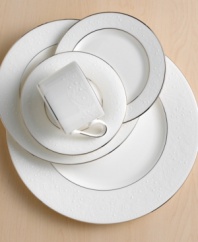 Beautiful and bridal-inspired, these classic white dinner plates from Lenox are richly textured with a delicate floral motif and raised, beaded accents. Finished with a band of polished platinum. Qualifies for Rebate
