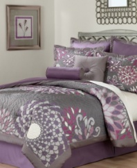 Bursts of blossoms in a modern, geometric print create dazzling style for any bedroom. The Bloom 8 piece comforter set features a comforter covered in a mosaic of blossom quilting with a smooth, tufted border. Solid accent pieces and a reverse of purple and silver enhance this collection with sweet and simple charm. (Clearance)