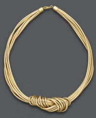 Get all tied up in knots. Update your wardrobe with this modern, knotted design. Necklace features eight silicone strands with 14k gold details. Approximate length: 18 inches.