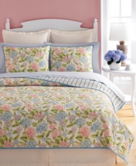 Fancy florals. Martha Stewart Collection's Hydrangea quilt features blooming flowers in an array of pink, purple and blue hues for a look full of nature-inspired charm. Finished with allover quilting details for plush texture. Reverses to a stripe pattern.