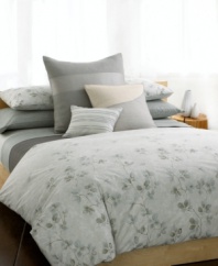 Serenity now. Create a calm atmosphere of luxury with the Quince sham from Calvin Klein. A watercolor print of stone and green florals adorns this ultra-soft sham in 100% pure combed cotton percale, evoking the essence of natural beauty with a purely modern allure. Self reversing. (Clearance)