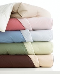 Get two looks with one comforter! This Sealy® reversible comforter allows you to change up the look of your room with ease. Made of 300-thread count cotton and down fill for superior comfort and warmth. Comes in five colors. (Clearance)