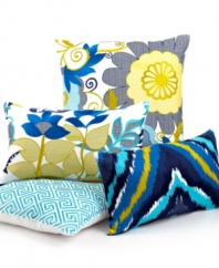 Bold and beautiful. Add a splash of color to your Trina Turk bed with this decorative pillow, featuring a modern floral design in shades of blue and green for an artistic appeal.