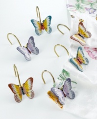 Bring spring whimsy into the bath with these pretty yet essential shower curtain hooks. Each of the 12 hooks is topped with a multicolored enamel butterfly. Simply charming.
