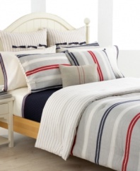 Finish your bed with a touch of classic Tommy style. The Newport Bay sheet set features 300-thread count cotton in ivory, embellished with a navy & red ticking stripe on the hem of the flat sheet and pillowcase.