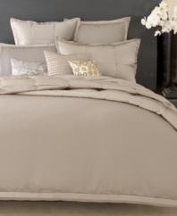 A simple design is transformed into fanciful sophistication with this Modern Classics Platinum Ash duvet cover from Donna Karan, featuring lush texture in a soothing colorway. Finished with silk trim. Button closure.