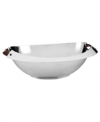 Polished aluminum alone makes Rivet serveware a standout, but with contrasting bronze handles and a sleek yet generously proportioned silhouette, this Dansk serving bowl embodies modern sophistication.