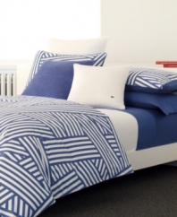 A new twist on nautical. Lacoste's Regate duvet cover set dresses your bed in seaworthy style with a bold print of intertwined, layered stripes in dutch blue and pure white. The duvet cover boasts button closure with pearl Lacoste buttons while the shams feature overlap closure. Also features pure cotton twill. (Clearance)