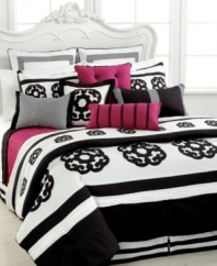A classic black and white palette is reinvented into modern sophistication in this Sabina comforter set, featuring floral and diamond designs, pleated details and quilted elements for a captivating display. The look is finished with hot pink accents for a touch of chic color.