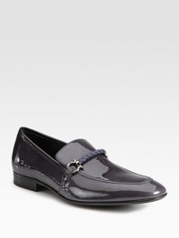 Slip-on classic crafted from shiny patent leather with woven detailing and signature ornament.Patent leather upperLeather liningPadded insoleLeather soleMade in Italy