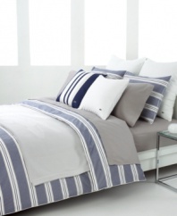 Redefine the look of your bedroom with these sophisticated stripes. Broad horizontal lines in vapor blue alternate with pinstripes for a studied, modern look upon rich cotton. Add a few quilted and solid Lacoste accents and you'll feel right at home with this urban bedding collection.