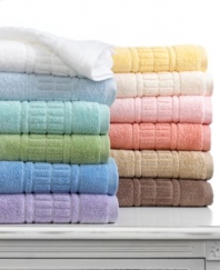 Daily showers become a sumptuous treat with Martha Stewart Collection's Plush hand towel. Featuring ultra-absorbent and fast-drying cotton embellished with a bold, tufted dobby. Choose from a spectrum of cheerful hues.