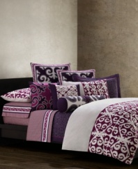 This Sumatra square decorative pillow features a deep purple ground that is accented with rich magenta. Chainstitch embroidery in pure white accents this unique design.