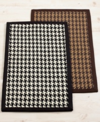 Classically Ralph. Featuring an allover houndstooth print in contrasting tones, this accent rug brings traditional style home. Finished with a solid cotton twill border; skid-resistant latex back.