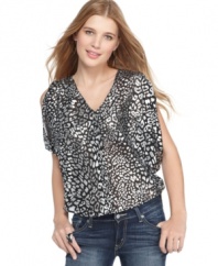 Punch up your jeans with fierce metallics that dare you to shine with this animal print blouse from Ali & Kris!