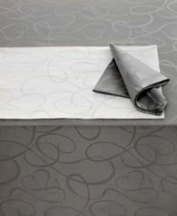 Sweet yet sophisticated, a flirty heart design twirls across this Love Story napkin from Mikasa. White and pewter linens are all dressed up with a radiant sheen, creating a fanciful backdrop for your finest occasions.