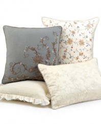 Utterly elegant, this English Isles decorative pillow features flowing floral embroidery on a soft cream ground for a smart presentation. Finished with decorative twisted cord. Button closure.