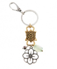 Pretty petals. A lightweight openwork flower charm adds springtime style to Lucky Brand's key chain. Set in gold tone and silver tone mixed metal, it's adorned with glass and plastic accents. Approximate length: 2-3/4 inches.