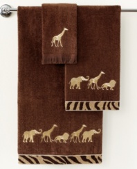 Embroidered animals in metallic gold embellish this Animal Parade hand towel, featuring coordinating cheetah chenille trim for a chic, safari-inspired look.
