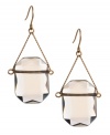 The epitome of sheer elegance. Kenneth Cole New York earrings feature smoky glass stone drops suspended from delicate chains. Setting crafted in worn gold tone mixed metal. Approximate drop: 1-1/2 inches.