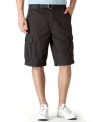 Cue up your casual collection for warmer weather with these easy-wear cargo shorts from Calvin Klein Jeans.