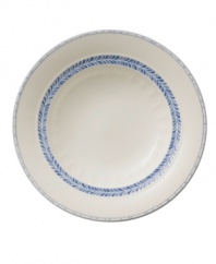 Vintage charm meets modern durability in the Farmhouse Touch rim soup bowl, featuring cornflower-blue laurels and bands in delicately embossed porcelain from Villeroy & Boch.