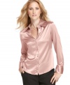 A sophisticated button-down blouse from Kasper with a pretty sheen and feminine tailoring for a dressy look.