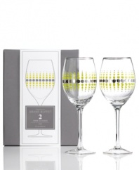 With a simply beautiful shape and funky dot design, this set of Charter Club's Novelty Fizz wine glasses creates an eye-catching look that's fun yet refined.