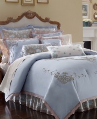 A delicate cutwork design in a taupe hue embellishes a cool blue background in this Rutledge comforter set from Lenox for a truly traditional air. Sham, comforter and bedskirt are edged with decorative trim for added style.