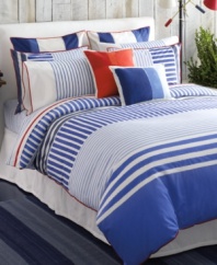 Bring the serene appeal of the sea to your bedroom with this nautical-inspired Mariner's Cove comforter set from Tommy Hilfiger, featuring blue stripes in different tones and alternating directions. Red trim completes this set for a look of coastal charm.