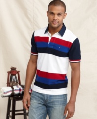 With bold and sporty color blocking, this polo shirt from Tommy Hilfiger will instantly score in your casual wardrobe.
