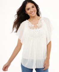 Style&co.'s tunic gets a springtime makeover with a romantic sheer fabric and a delicate, rhinestone-trimmed crochet bib!